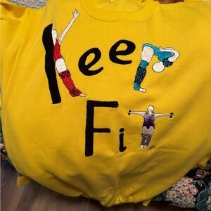 Shirlee designs Bright Yellow Embroidered Sweatshirt with Multicolor Stitching